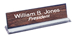Contemporary Style Acrylic Name Plate Holder.  Available in 8" and 10" lengths and choice of Clear or Black Acrylic. A versatile and economic choice for name and titles, counter base messages, and custom signs in many colors and fonts, for medical offices